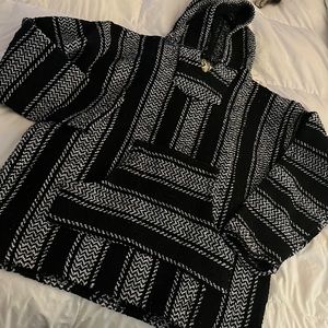 Black and white Baja sweatshirt (“drug rug”)